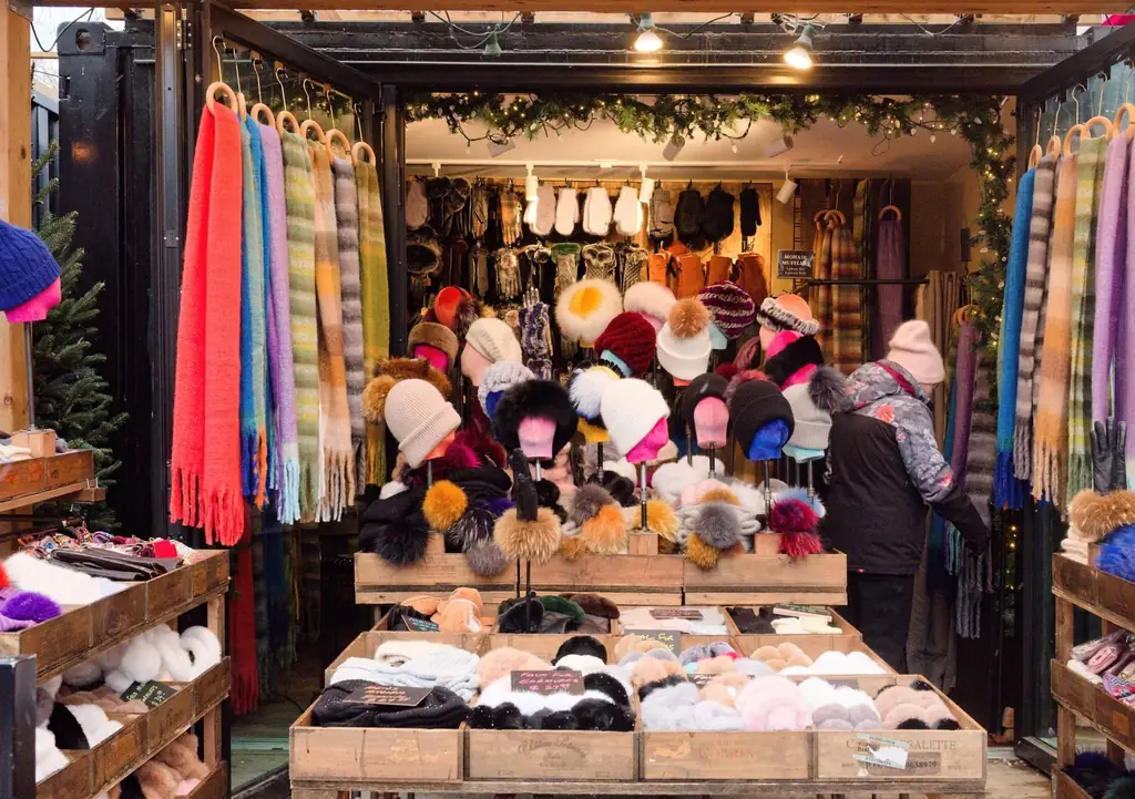 Colorful scarves and hats on display at a Toronto winter market stall