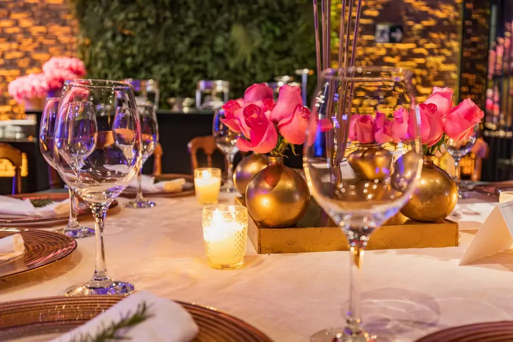 Decorated table with candles and roses