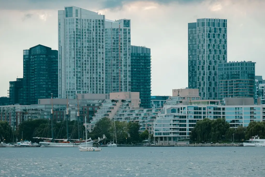 View of Toronto's skyline featuring modern buildings and a harborfront scene