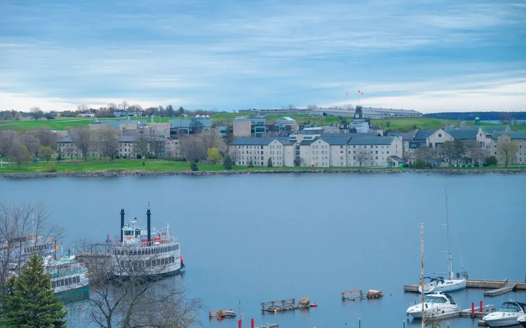 Kingston harborfront with serene waters and charming architecture