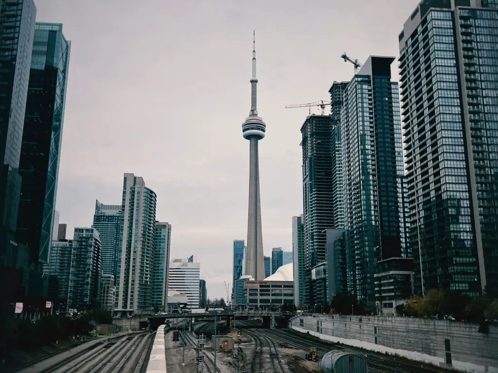 View of Toronto's skyline featuring the CN Tower among modern skyscrapers and urban architecture