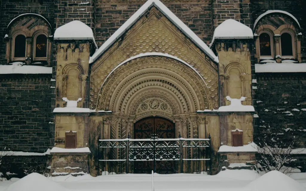 Snow on the Gothic entrance of a University of Toronto building