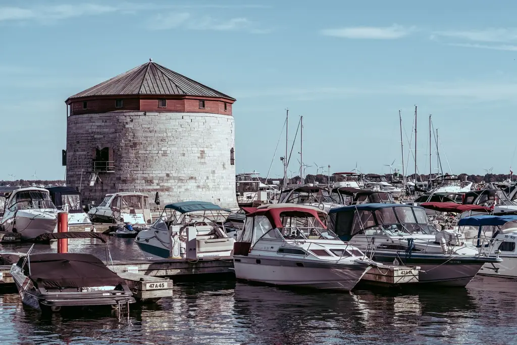 View of Shoal Tower surrounded by boats in Kingston Harbor, Ontario, Canada