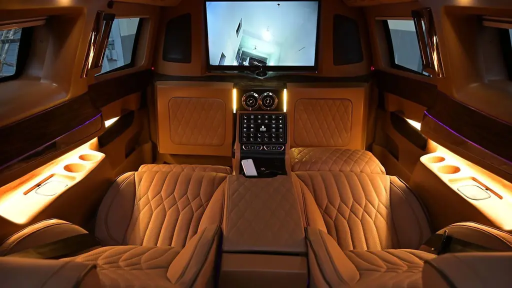 Limousine interior featuring plush leather seats and ambient lighting for ultimate comfort