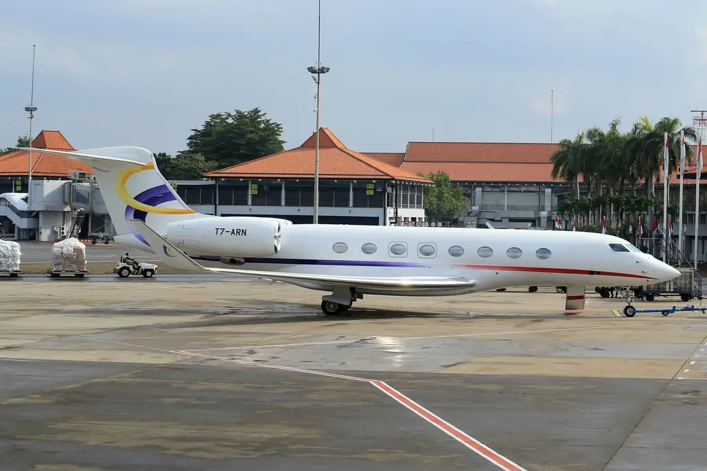Gulfstream business jet parked on an airport apron