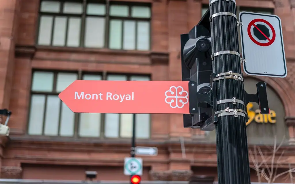 A directional street sign pointing to Mont Royal in downtown Montreal, Canada