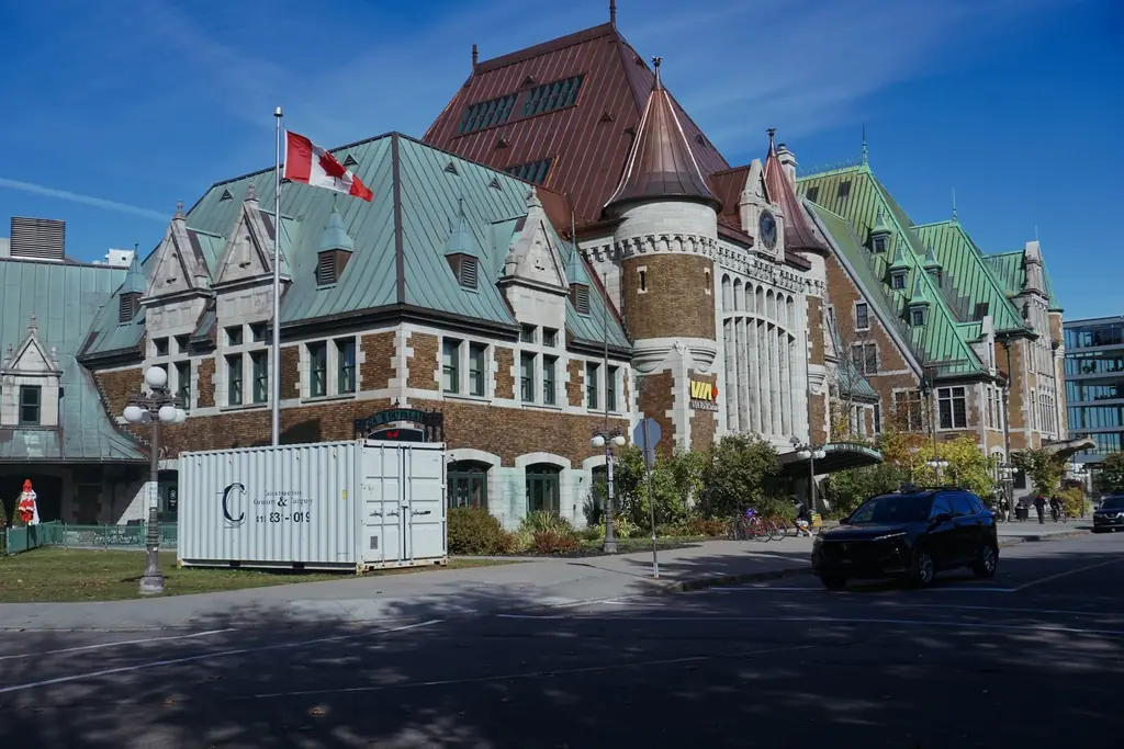 Château-style railway station building with copper roofs in Québec City