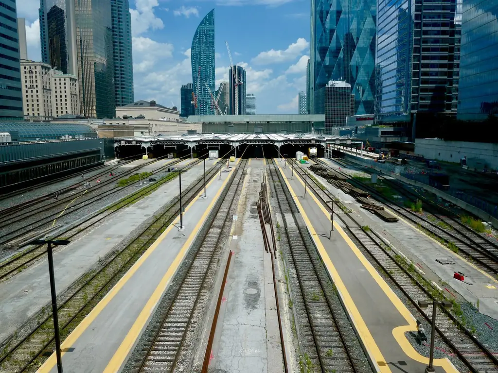 Aerial view of Toronto Union Station with modern skyline and railway tracks